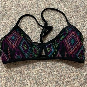Black target bathing suit top
